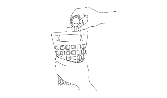A water sample is poured into the MPNTray for E. coli detection using the MPN method.