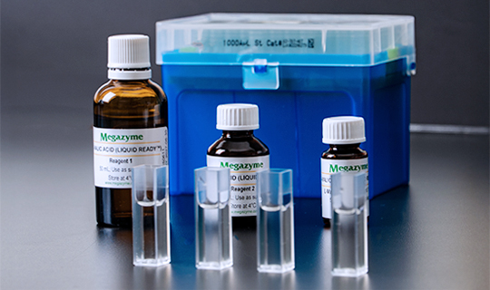 image of Liquid Ready products in front of a container