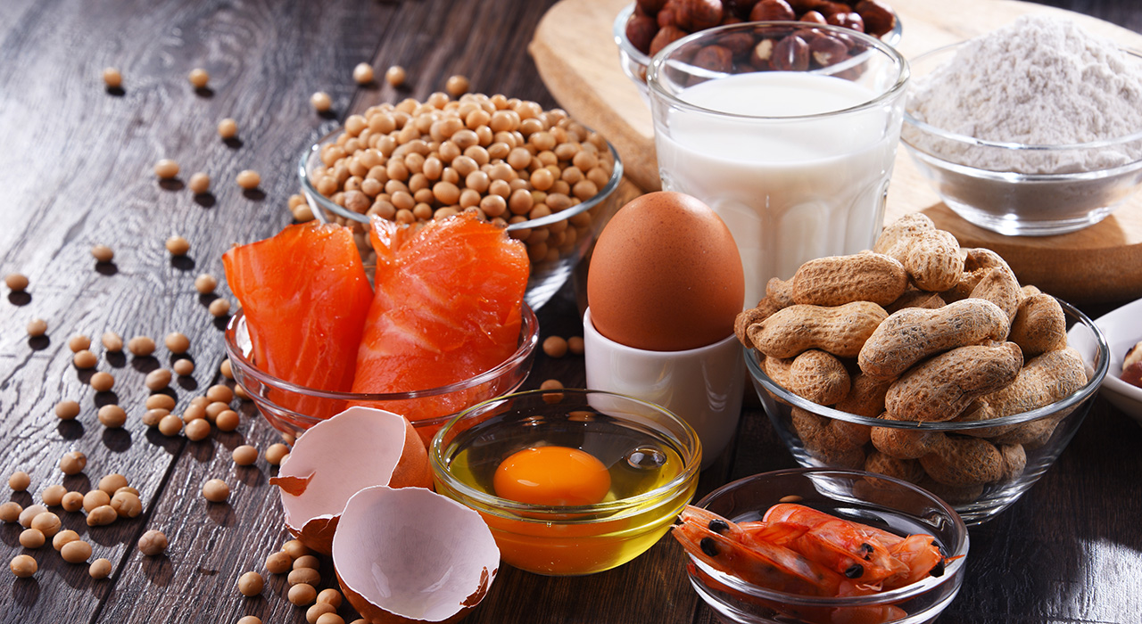 Assortment of common food allergens such as milk, eggs, peanuts, soybeans, wheat flour, fish, and shellfish used in food manufacturing.