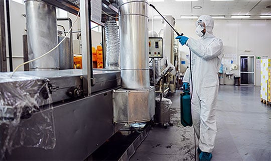 Cleaning a production facility
